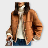 Elegáns bőrkabát meleg béléssel és klasszikus stílussal